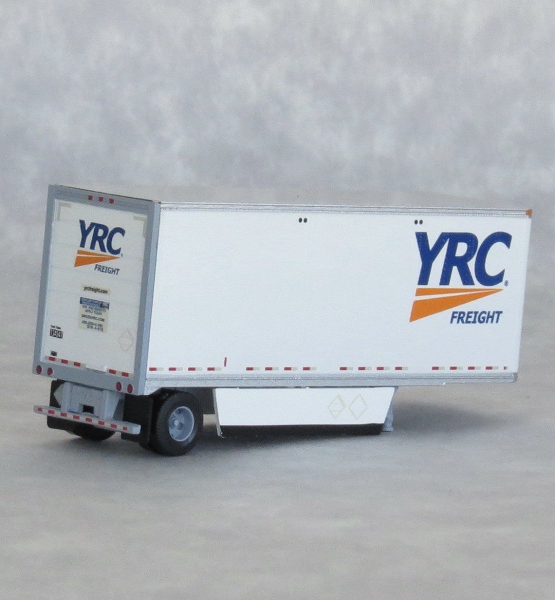 TrainWorx 42890 - 05 N Scale YRC (Yellow Roadway) 28' Pup Van Trailer + Converter Dolly (LTL Doubles) - Oakville Model Trains Depot