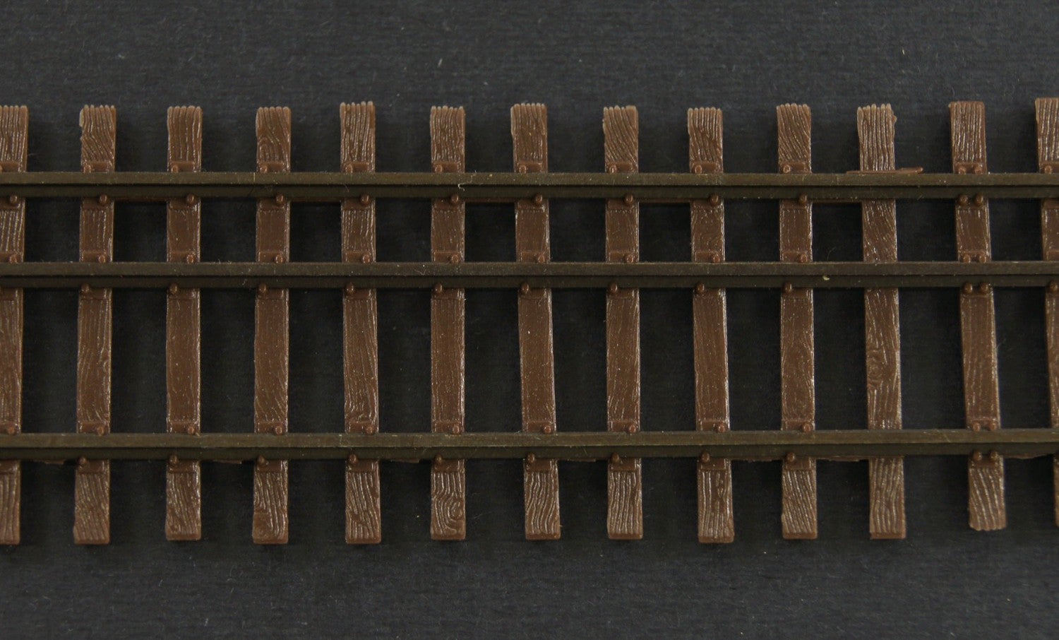 Micro Engineering 12-112 HO-HOn3 Code 55 Dual Gauge Weathered Flex-Track - 6pcs