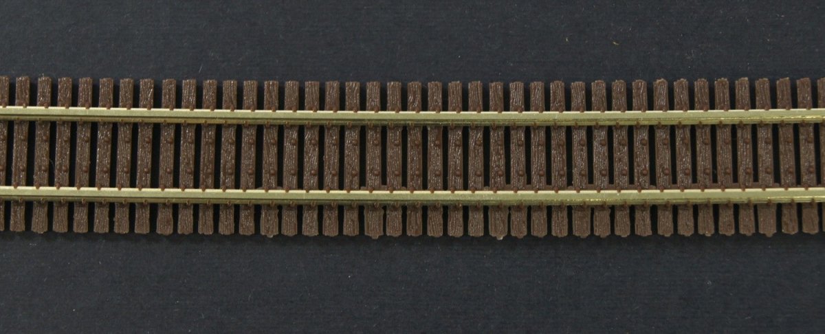 Micro Engineering 11 - 101 HO Scale Code 83 Bridge Flex Track with Wide Ties & Guard Rails - 36" / 914mm - Oakville Model Trains Depot