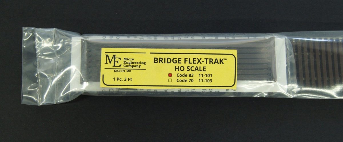 Micro Engineering 11 - 101 HO Scale Code 83 Bridge Flex Track with Wide Ties & Guard Rails - 36" / 914mm - Oakville Model Trains Depot
