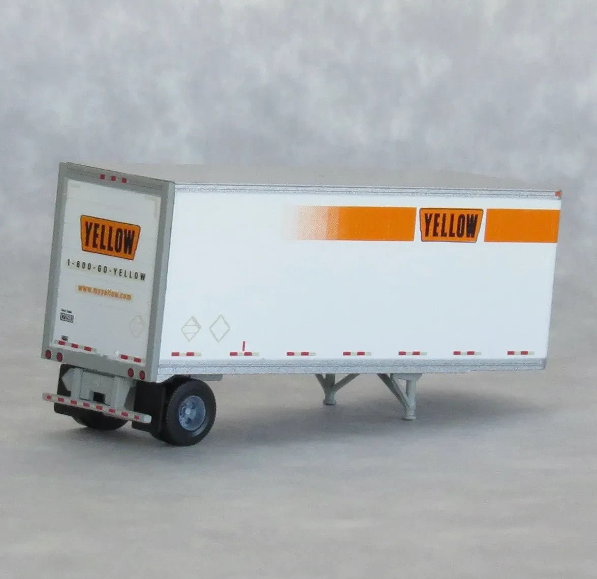 TrainWorx 42885 - 02 N Scale Yellow Freight (Orange) 28' Pup Van Trailer + Converter Dolly (LTL Doubles) - Oakville Model Trains Depot