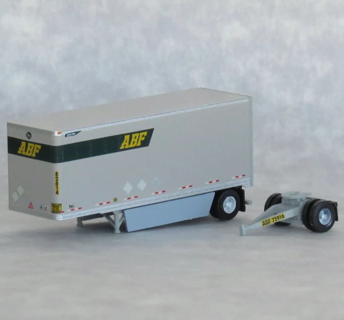 TrainWorx 42893 - 01 N Scale ABF Freight System 28' Pup Van Trailer + Converter Dolly (LTL Doubles) - Oakville Model Trains Depot