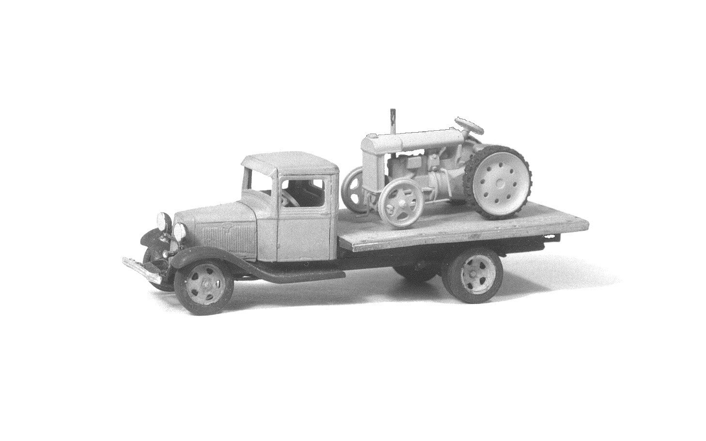 Micro Engineering 96-128 HO Scale 1934 Ford Flatbed Truck with Tractor Load